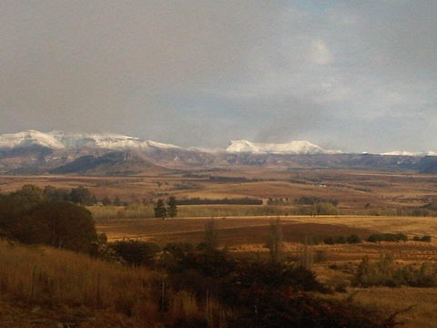 Snow on mountain peaks - from from manor house
